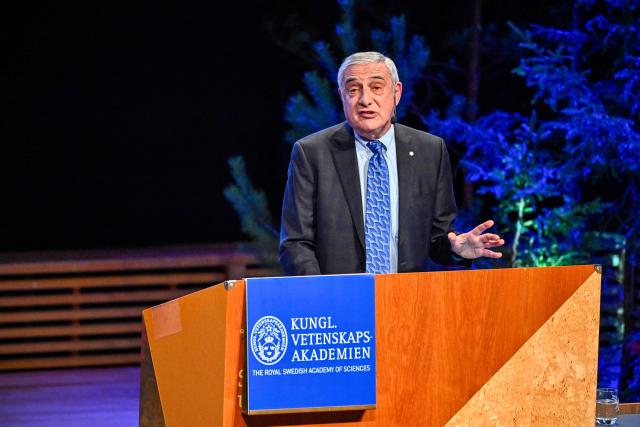 Laureate of The Sveriges Riksbank Prize in Economic Sciences 2025 US-Israeli economic historian Joel Mokyr gives a lecture at the Aula Magna at Stockholm University in Stockholm, Sweden, on December 8, 2025. Laureates will receive their Nobel prizes at formal ceremonies in Stockholm and Oslo on December 10. That date is the anniversary of the death in 1896 of scientist Alfred Nobel, who created the prizes in his will. (Photo by Christine OLSSON / TT NEWS AGENCY / AFP) / Sweden OUT
