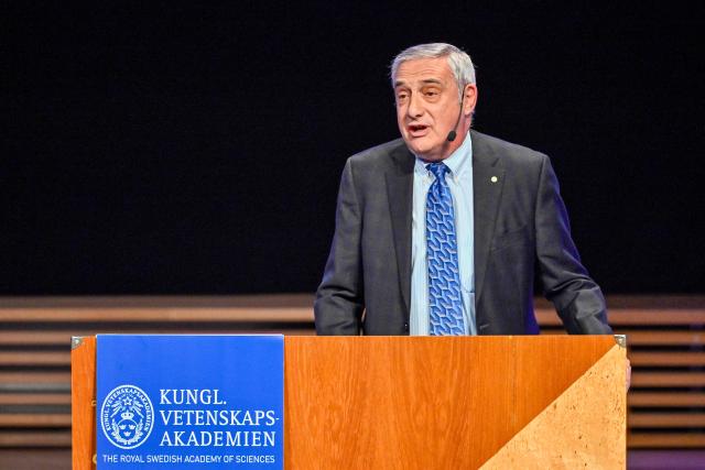 Laureate of The Sveriges Riksbank Prize in Economic Sciences 2025 US-Israeli economic historian Joel Mokyr gives a lecture at the Aula Magna at Stockholm University in Stockholm, Sweden, on December 8, 2025. Laureates will receive their Nobel prizes at formal ceremonies in Stockholm and Oslo on December 10. That date is the anniversary of the death in 1896 of scientist Alfred Nobel, who created the prizes in his will. (Photo by Christine OLSSON / TT NEWS AGENCY / AFP) / Sweden OUT