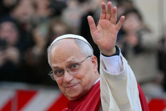 Pope Leo XIV waves to the crowd from the popemobile at the Spanish steps as he arrives to pay homage to the Immaculate Conception, in Rome, on December 8, 2025. (Photo by Tiziana FABI / AFP)