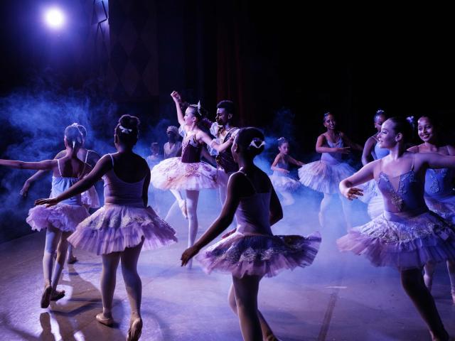 TOPSHOT - Members of Dance Centre Kenya (DCK) perform in their 10th-anniversary annual ballet production, The Nutcracker, with the DCK Orchestra at the Kenya National Theatre in Nairobi on December 6, 2025. Dance Centre Kenya (DCK) is one of East Africas leading performing arts schools, training hundreds of students each year in ballet, contemporary, and other dance forms, and provides opportunities for talented young dancers from diverse socioeconomic backgrounds to perform in major productions like The Nutcracker. (Photo by YASUYOSHI CHIBA / STF / AFP)