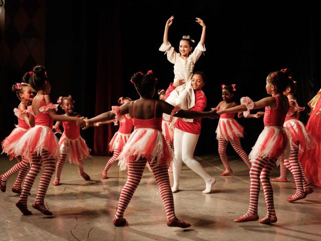 Members of Dance Centre Kenya (DCK) perform in their 10th-anniversary annual ballet production, The Nutcracker, with the DCK Orchestra at the Kenya National Theatre in Nairobi on December 6, 2025. Dance Centre Kenya (DCK) is one of East Africas leading performing arts schools, training hundreds of students each year in ballet, contemporary, and other dance forms, and provides opportunities for talented young dancers from diverse socioeconomic backgrounds to perform in major productions like The Nutcracker. (Photo by YASUYOSHI CHIBA / STF / AFP)