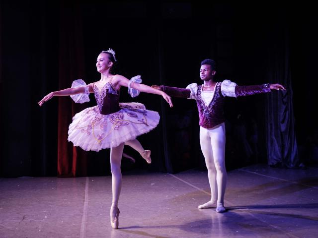 Members of Dance Centre Kenya (DCK) perform in their 10th-anniversary annual ballet production, The Nutcracker, with the DCK Orchestra at the Kenya National Theatre in Nairobi on December 6, 2025. Dance Centre Kenya (DCK) is one of East Africas leading performing arts schools, training hundreds of students each year in ballet, contemporary, and other dance forms, and provides opportunities for talented young dancers from diverse socioeconomic backgrounds to perform in major productions like The Nutcracker. (Photo by YASUYOSHI CHIBA / STF / AFP)