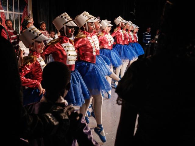 Members of Dance Centre Kenya (DCK) perform in their 10th-anniversary annual ballet production, The Nutcracker, with the DCK Orchestra at the Kenya National Theatre in Nairobi on December 6, 2025. Dance Centre Kenya (DCK) is one of East Africas leading performing arts schools, training hundreds of students each year in ballet, contemporary, and other dance forms, and provides opportunities for talented young dancers from diverse socioeconomic backgrounds to perform in major productions like The Nutcracker. (Photo by YASUYOSHI CHIBA / STF / AFP)