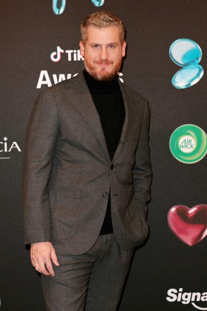 French patissier Yann Couvreur poses during the photocall before the third edition of the Tiktok Awards ceremony at the Lido cabaret, in Paris on December 8, 2025. (Photo by Thomas SAMSON / AFP)