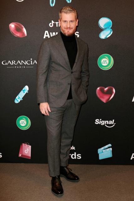 French patissier Yann Couvreur poses during the photocall before the third edition of the Tiktok Awards ceremony at the Lido cabaret, in Paris on December 8, 2025. (Photo by Thomas SAMSON / AFP)