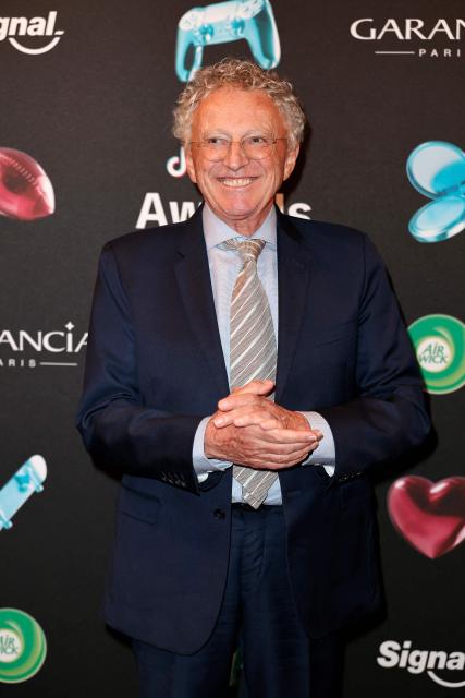 French journalist Nelson Montfort poses during the photocall before the third edition of the Tiktok Awards ceremony at the Lido cabaret, in Paris on December 8, 2025. (Photo by Thomas SAMSON / AFP)