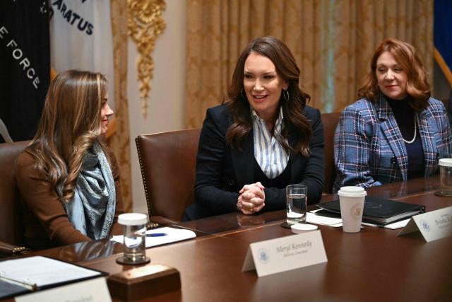 US Secretary of Agriculture Brooke Rollins (C) speaks during a roundtable event to discuss aid for farmers, in the Cabinet Room of the White House in Washington, DC, on December 8, 2025. President Trump is announcing a $12 billion aid package for US farmers, targeting a key support base hit by his trade policies. Since Trump's return to the White House in January, many US farmers have been battered by impacts of his wide-ranging tariffs, including retaliatory measures from trading partners. (Photo by ANDREW CABALLERO-REYNOLDS / AFP)