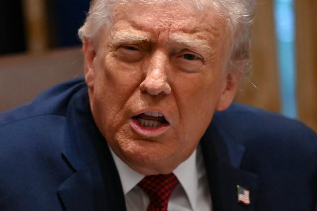 US President Donald Trump speaks during a roundtable event to discuss aid for farmers, in the Cabinet Room of the White House in Washington, DC, on December 8, 2025. President Trump is announcing a $12 billion aid package for US farmers, targeting a key support base hit by his trade policies. Since Trump's return to the White House in January, many US farmers have been battered by impacts of his wide-ranging tariffs, including retaliatory measures from trading partners. (Photo by ANDREW CABALLERO-REYNOLDS / AFP)