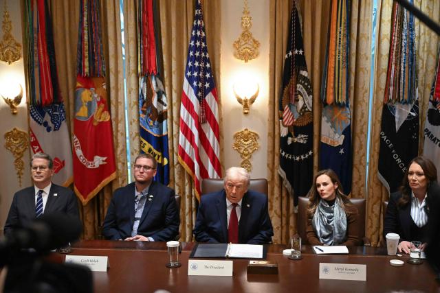 (L-R) US Secretary of Treasury Scott Bassent, Cordt Holub from NuTech Seed, US President Donald Trump, Meryl Kennedy, CEO of 4Sisters Rice and US Secretary of Agriculture Brooke Rollins look on during a roundtable event to discuss aid for farmers, in the Cabinet Room of the White House in Washington, DC, on December 8, 2025. President Trump is announcing a $12 billion aid package for US farmers, targeting a key support base hit by his trade policies. Since Trump's return to the White House in January, many US farmers have been battered by impacts of his wide-ranging tariffs, including retaliatory measures from trading partners. (Photo by ANDREW CABALLERO-REYNOLDS / AFP)