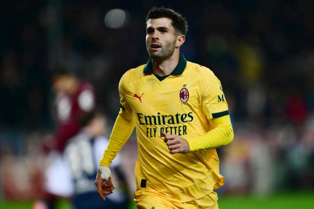 AC Milan's US forward #11 Christian Pulisic celebrates scoring his team's third goal during the Italian Serie A football match between Torino and AC Milan at the Allianz stadium in Turin, on December 8, 2025. (Photo by Marco BERTORELLO / AFP)