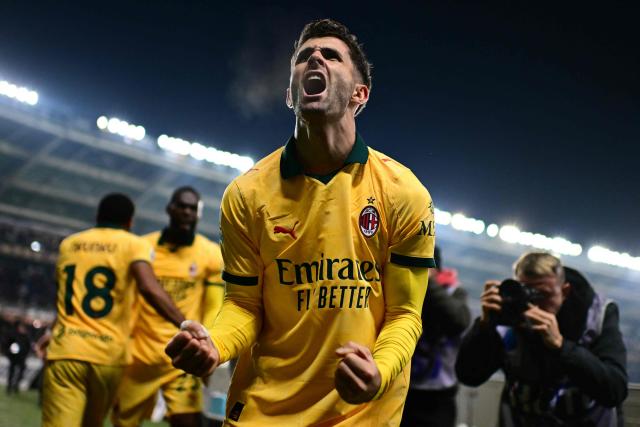 AC Milan's US forward #11 Christian Pulisic celebrates after scoring his team's third goal during the Italian Serie A football match between Torino and AC Milan at the Allianz stadium in Turin, on December 8, 2025. (Photo by Marco BERTORELLO / AFP)