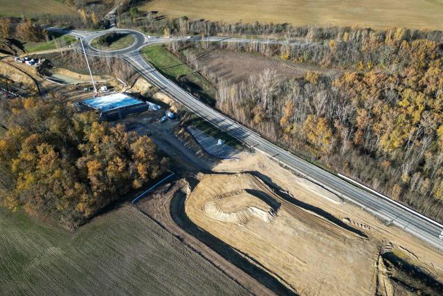 This aerial view, taken on December 8, 2025 in Saix, shows an area of illegal encroachment on the A69 motorway construction site. The prefects of Haute-Garonne and Tarn say they have noted overruns in the construction area of the A69 motorway, as denounced by opponents of the project, and are demanding explanations from the concessionaire, according to a statement released on December 2, 2025. (Photo by Lionel BONAVENTURE / AFP)