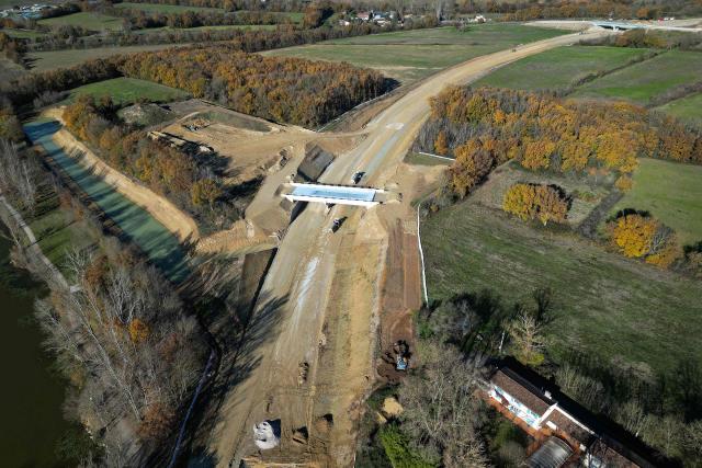 This aerial view, taken on December 8, 2025 in Saix, shows an area of illegal encroachment on the A69 motorway construction site. The prefects of Haute-Garonne and Tarn say they have noted overruns in the construction area of the A69 motorway, as denounced by opponents of the project, and are demanding explanations from the concessionaire, according to a statement released on December 2, 2025. (Photo by Lionel BONAVENTURE / AFP)