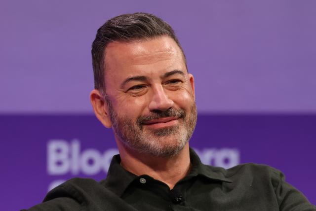 (FILES) Comedian and TV producer Jimmy Kimmel speaks during the Bloomberg Screentime conference in Los Angeles on October 8, 2025. Jimmy Kimmel has extended his contract with Disney-owned ABC for a year, sources said on December 8, 2025, months after his late-night show was yanked off the air in a confrontation with President Donald Trump's administration. (Photo by Patrick T. Fallon / AFP)