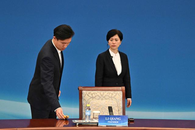 Security personnel work ahead of the 1+10 Dialogue with leaders of International Economic Organisations, with China’s Premier Li Qiang in Beijing on December 9, 2025. (Photo by Pedro PARDO and Pedro Pardo / POOL / AFP)