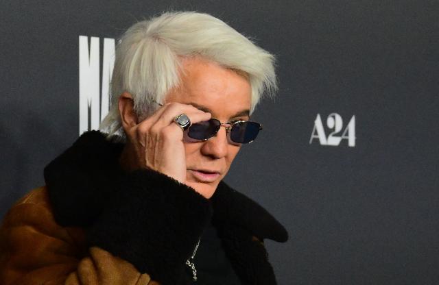 Australian director Baz Luhrmann attends the premiere of "Marty Supreme" in Los Angeles, California, on December 8, 2025. (Photo by Frederic J. BROWN / AFP)