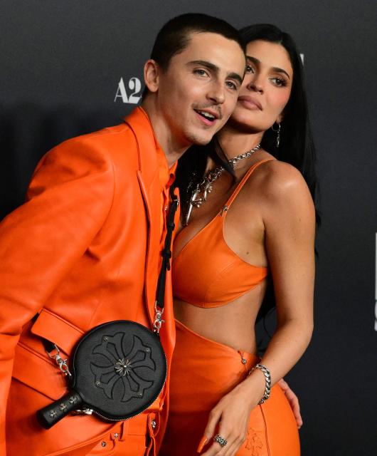 US-French actor Timothee Chalamet (L) and US media personality Kylie Jenner attend the premiere of "Marty Supreme" in Los Angeles, California, on December 8, 2025. (Photo by Frederic J. BROWN / AFP)