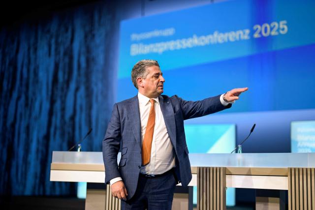 Thyssenkrupp CEO Miguel Angel Lopez Borrego arrives to address the annual news conference of German industrial titan Thyssenkrupp at the company's headquarters in Essen, western Germany on December 9, 2025. The company announced it expected a loss next year as it grapples with a tough market environment and seeks to offload employees. The firm said it would lose between 400 and 800 million euros ($466 and $932 million) in 2026 because of weak demand and "in particular" the costs of restructuring its steel business. (Photo by Ina FASSBENDER / AFP)