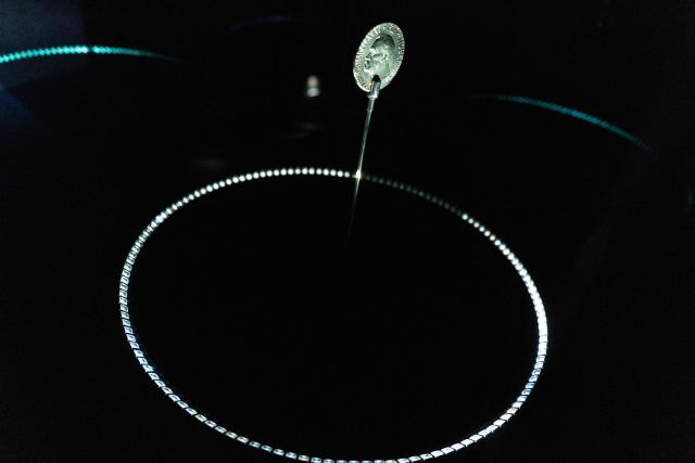 The Alfred Nobel medal is seen at the exhibition "Democracy on the brink" in honour of Nobel Peace Prize laureate Maria Corina Machado at the Nobel Peace Center in Oslo on December 9, 2025, on the eve of the Nobel Peace Prize ceremony. The new exhibition featuring the 2025 laureate opens to the public on December 12, 2024. (Photo by Odd ANDERSEN / AFP)