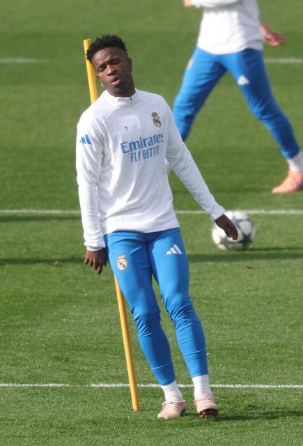 Real Madrid's Brazilian forward #07 Vinicius Junior attends a training session on the eve of the UEFA Champions League league phase day 6 football match between Real Madrid CF and Manchester City at the Real Madrid Sports City of Valdebebas, near Madrid on December 9, 2025. (Photo by Pierre-Philippe MARCOU / AFP)