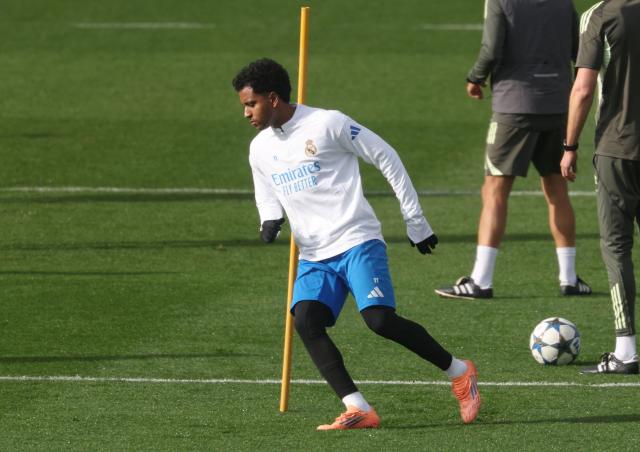 Real Madrid's Brazilian forward #11 Rodrygo attends a training session on the eve of the UEFA Champions League league phase day 6 football match between Real Madrid CF and Manchester City at the Real Madrid Sports City of Valdebebas, near Madrid on December 9, 2025. (Photo by Pierre-Philippe MARCOU / AFP)