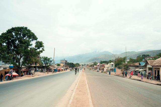 A general view of a deserted street in Uvira on December 9, 2025. Intense fighting is taking place on Tuesday in the eastern Democratic Republic of Congo (DRC), with the M23 group, supported by the Rwandan army, continuing its rapid advance towards Uvira, a strategic Congolese city located near the border with neighboring Burundi and now under threat. The anti-government armed group and the Rwandan soldiers—estimated at 6,000 to 7,000 on Congolese soil according to UN experts—were reportedly only about fifteen kilometers north of the city, home to several hundred thousand inhabitants, as of Tuesday morning, according to security and military sources cited by AFP. (Photo by AFP)