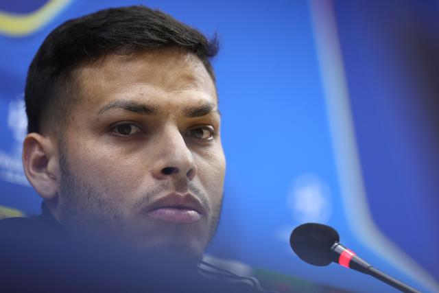Qarabag's Brazilian defender #02 Matheus de Barros da Silva attends a press conference at the Tofiq Bahramov Republican Stadium in Baku on December 9, 2025, on the eve of the UEFA Champions League league phase football match between Qarabag and Ajax. (Photo by Giorgi ARJEVANIDZE / AFP)