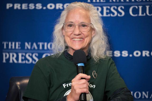 Debra Tice, mother of missing US journalist Austin Tice, speaks during an event at the National Press Club "to address his case one year after the fall of Damascus" on December 9, 2025 in Washington, DC. Tice was kidnapped while reporting in Syria in August 2012. (Photo by Oliver Contreras / AFP)