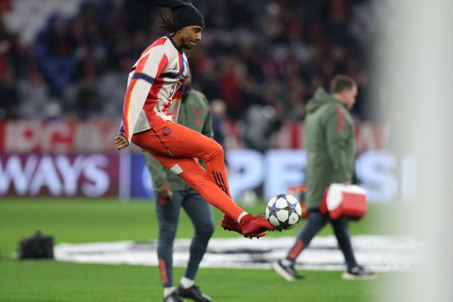 Bayern Munich's French midfielder #17 Michael Olise warms up prior the UEFA Champions League, league phase - day 6 football match between Bayern Munich and Sporting CP in Dortmund, western Germany, on December 9, 2025. (Photo by Alexandra BEIER / AFP)