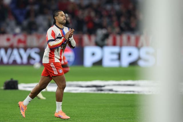 Bayern Munich's German forward #07 Serge Gnabry warms up prior the UEFA Champions League, league phase - day 6 football match between Bayern Munich and Sporting CP in Dortmund, western Germany, on December 9, 2025. (Photo by Alexandra BEIER / AFP)