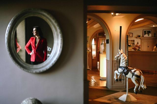 (FILES) Berangere Loiseau, daughter of the late French chef Bernard Loiseau, is reflected in a mirror as she poses for a photograph at the restaurant "La Cфte d’Or - Le Relais Bernard Loiseau" in Saulieu, central France, on February 9, 2023. Dijon, Beaune, Besanзon, Metz, and even Tokyo: despite the suicide of its eponymous owner, three-star chef Bernard Loiseau, in 2003, the establishment he founded 50 years ago has become a small empire. (Photo by Olivier CHASSIGNOLE / AFP)