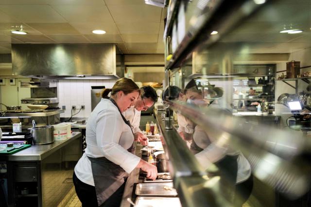 (FILES) Blanche Loiseau, daughter of the late French chef Bernard Loiseau, works in the kitchen in the restaurant "La Cфte d’Or - Le Relais Bernard Loiseau" in Saulieu, central France, on February 9, 2023. Dijon, Beaune, Besanзon, Metz, and even Tokyo: despite the suicide of its eponymous owner, three-star chef Bernard Loiseau, in 2003, the establishment he founded 50 years ago has become a small empire. (Photo by Olivier CHASSIGNOLE / AFP)