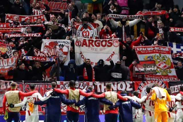 Olympiacos' players celebrate after the UEFA Champions League league phase football match between Kairat Almaty and Olympiacos at the Astana Arena in Astana on December 9, 2025. (Photo by STANISLAV FILIPPOV / AFP)