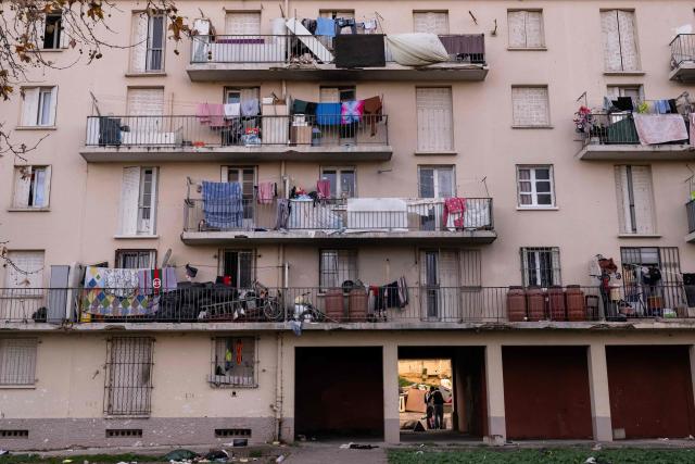 This photograph shows buildings of the "La Cite des Rosiers" residential complex, in the Sainte Marthe neighborhood, northern Marseille, on December 9, 2025. (Photo by Miguel MEDINA / AFP)
