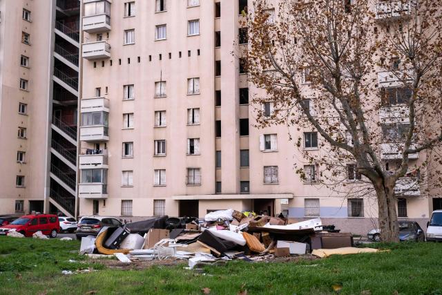 This photograph shows buildings of the "La Cite des Rosiers" residential complex, in the Sainte Marthe neighborhood, northern Marseille, on December 9, 2025. (Photo by Miguel MEDINA / AFP)