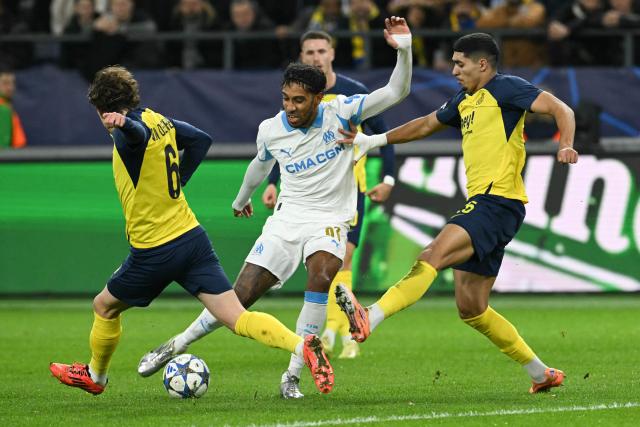 Marseille's Gabonese forward #97 Pierre-Emerick Aubameyang (C) controls the ball during the UEFA Champions League, league phase day 6, football match between Royale Union Saint-Gilloise (BEL) and Olympique de Marseille (FRA), at the RSC Anderlecht Stadium in Brussels, on December 9, 2025. (Photo by NICOLAS TUCAT / AFP)