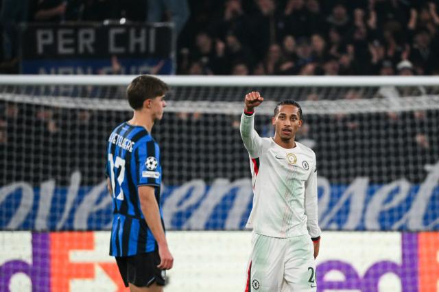 Chelsea's Brazilian striker #20 Joao Pedro celebrates after scoring his team's first goal during the UEFA Champions League league phase day 6 football match between Atalanta Bergamo and Chelsea FC at Bergamo Stadium, in Bergamo, on December 9, 2025. (Photo by Alberto PIZZOLI / AFP)