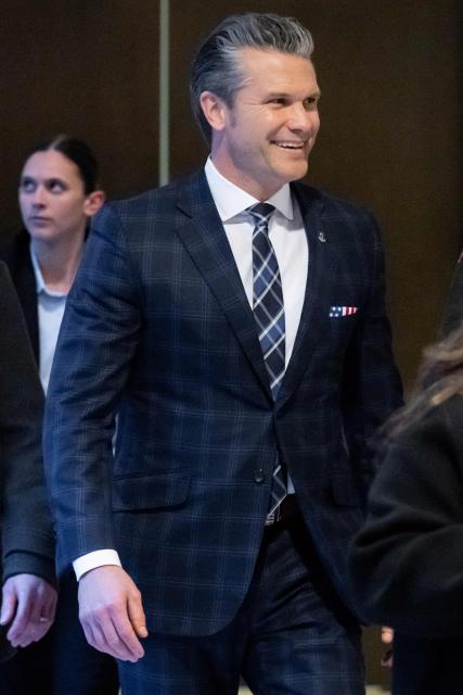 US Secretary of Defense Pete Hegseth arrives for a meeting with Congressional leadership on the military strikes against drug boats in the Caribbean, on Capitol Hill in Washington, DC, December 9, 2025. (Photo by SAUL LOEB / AFP)