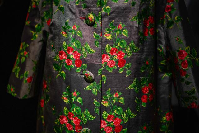 This photograph shows a dress by Christian Dior displayed at the exhibition "Azzedine Alaia and Christian Dior, Two Masters of Haute Couture" from the Azzedine Alaia Foundation at La Galerie Dior in Paris, on December 9, 2025. The exhibition will run untill May 3, 2026. (Photo by Dimitar DILKOFF / AFP)