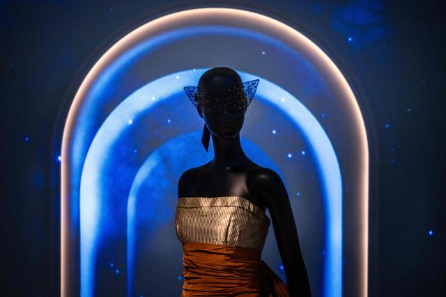 This photograph shows a dress by Christian Dior on a mannequin displayed at the exhibition "Azzedine Alaia and Christian Dior, Two Masters of Haute Couture" from the Azzedine Alaia Foundation at La Galerie Dior in Paris, on December 9, 2025. The exhibition will run untill May 3, 2026. (Photo by Dimitar DILKOFF / AFP)