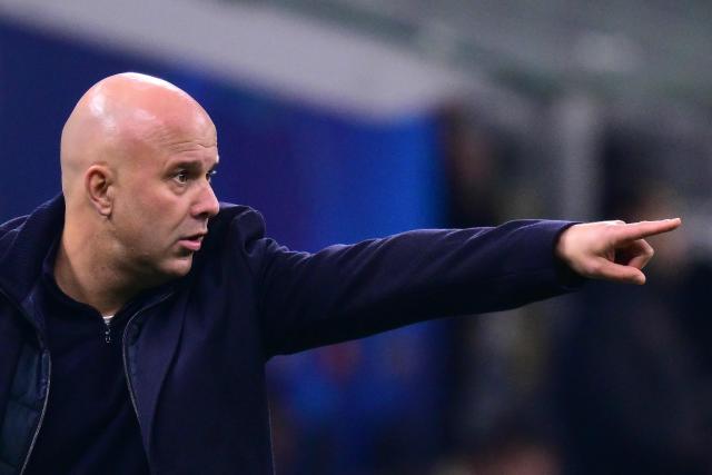 Liverpool's Dutch manager Arne Slot gestures during the UEFA Champions League phase day 6 football match between Inter Milan and Liverpool at San Siro stadium in Milan, on December 9, 2025. (Photo by Stefano RELLANDINI / AFP)