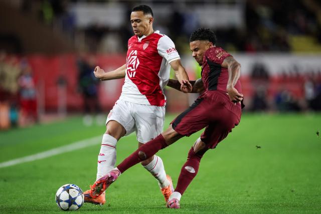 Monaco's Brazilian defender #02 Vanderson (L) fights for the ball with Galatasaray's Senegalese defender #04 Ismail Jakobs during the UEFA Champions League, league phase, football match between Monaco and Galatasaray, at the Stade Louis II stadium, in Monaco, on December 9, 2025. (Photo by Valery HACHE / AFP)