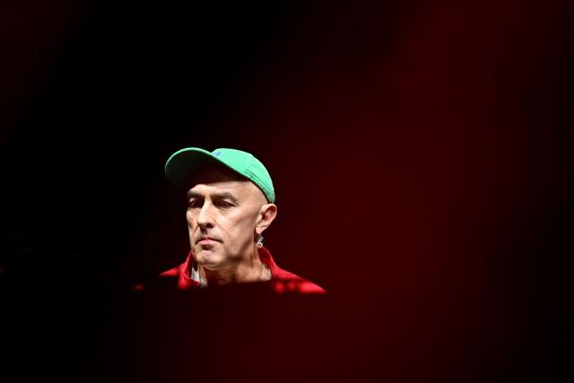 French musician and author Yann Tiersen performs during a "Together for Palestine" benefit concert at the Zenith Paris event venue, in Paris on December 9, 2025. (Photo by Anna KURTH / AFP)