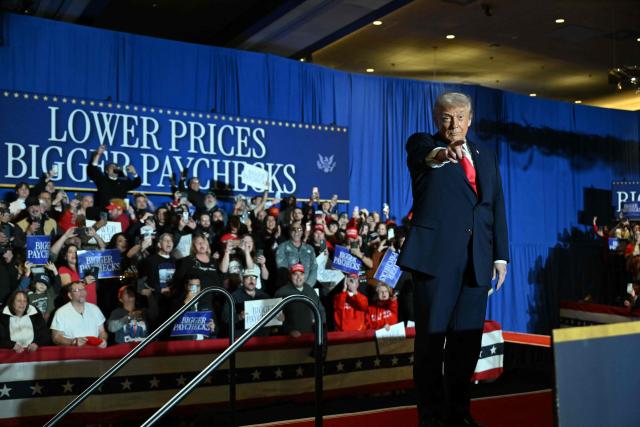 US President Donald Trump cheers attendees upon his arrival to deliver remarks on the economy at Mount Airy Casino Resort in Mount Pocono, Pennsylvania, on December 9, 2025. (Photo by ANDREW CABALLERO-REYNOLDS / AFP)
