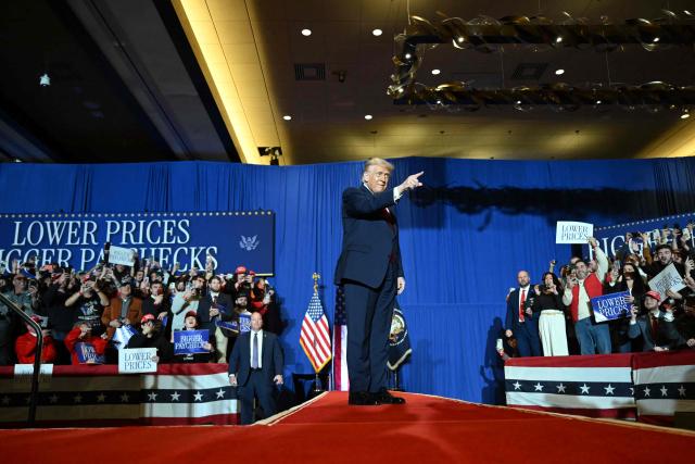 US President Donald Trump cheers the attendees upon his arrival to deliver remarks on the economy at Mount Airy Casino Resort in Mount Pocono, Pennsylvania, on December 9, 2025. (Photo by ANDREW CABALLERO-REYNOLDS / AFP)