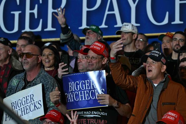 Attendees chant "four more years" as US President Donald Trump delivers remarks on the economy at Mount Airy Casino Resort in Mount Pocono, Pennsylvania, on December 9, 2025. (Photo by ANDREW CABALLERO-REYNOLDS / AFP)