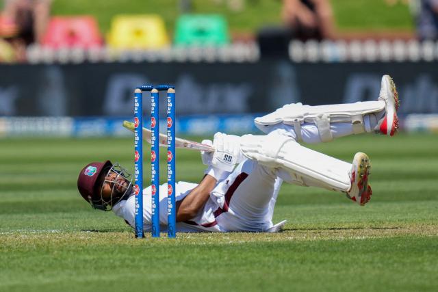 West Indies Shai Hope falls over after ducking from the ball during day one of the 2nd international Test cricket match between New Zealand and West Indies at the Basin reserve in Wellington on December 10, 2025. (Photo by Marty MELVILLE / AFP)