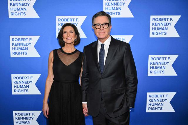 US television host and writer Stephen Colbert (R) and his wife Evelyn McGee-Colbert attend the Robert F. Kennedy Human Rights 'Ripple of Hope Awards Gala' in New York City, on December 9, 2025. (Photo by ANGELA WEISS / AFP)