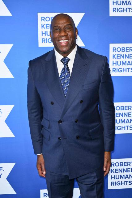 Former US basketball player Earvin "Magic" Johnson attends the Robert F. Kennedy Human Rights 'Ripple of Hope Awards Gala' in New York City, on December 9, 2025. (Photo by ANGELA WEISS / AFP)