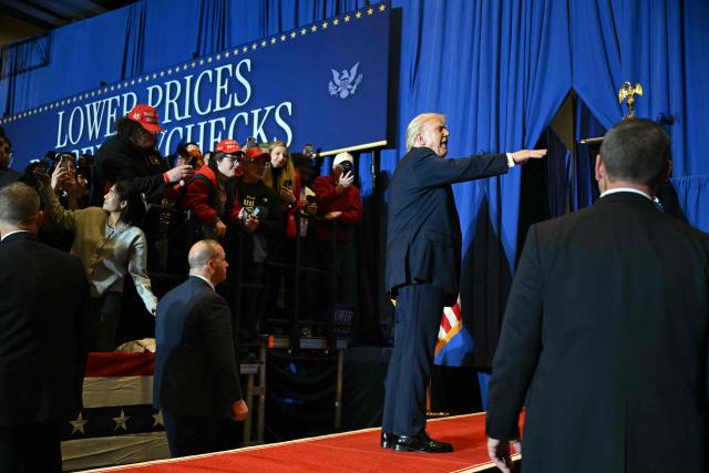 US President Donald Trump interacts with attendees after he delivered remarks on the economy at Mount Airy Casino Resort in Mount Pocono, Pennsylvania, on December 9, 2025. (Photo by ANDREW CABALLERO-REYNOLDS / AFP)